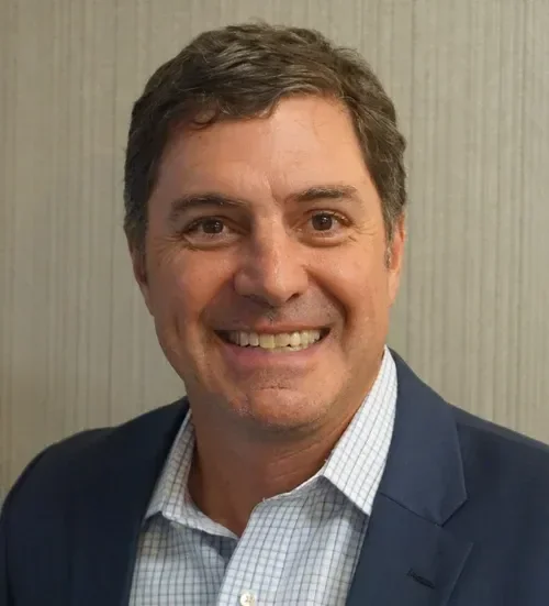 Headshot of Chris Manley in professional attire